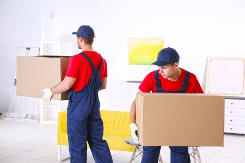 Movers team preparing a safe home move with protective equipment