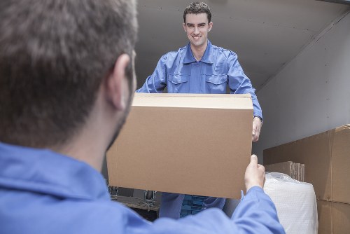 Furniture removal team handling sofas and household items in Camden