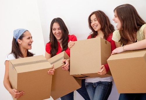 Boxes and household items being sorted for reuse and recycling during a move