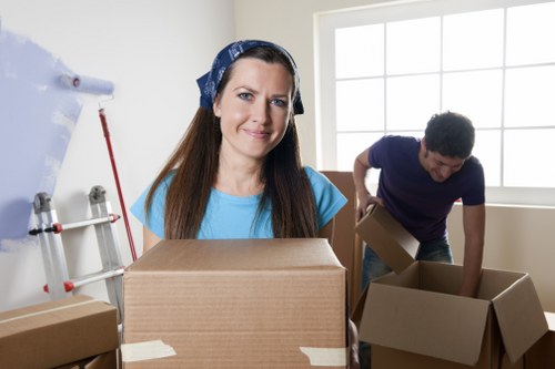 Movers securing items safely inside a transport vehicle