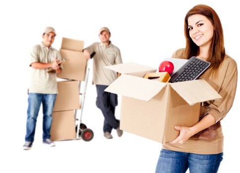 Moving truck and removal crew preparing for a local Camden property