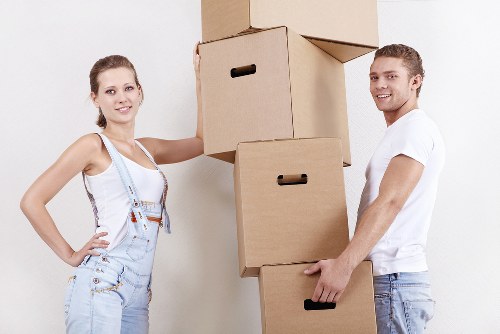 Movers Camden transporting household furniture carefully into a new property
