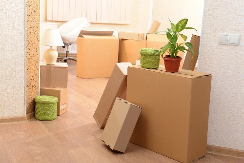 Preparation checklist and packed furniture ready for a Camden move