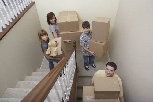 Furniture being carried through a Camden property staircase
